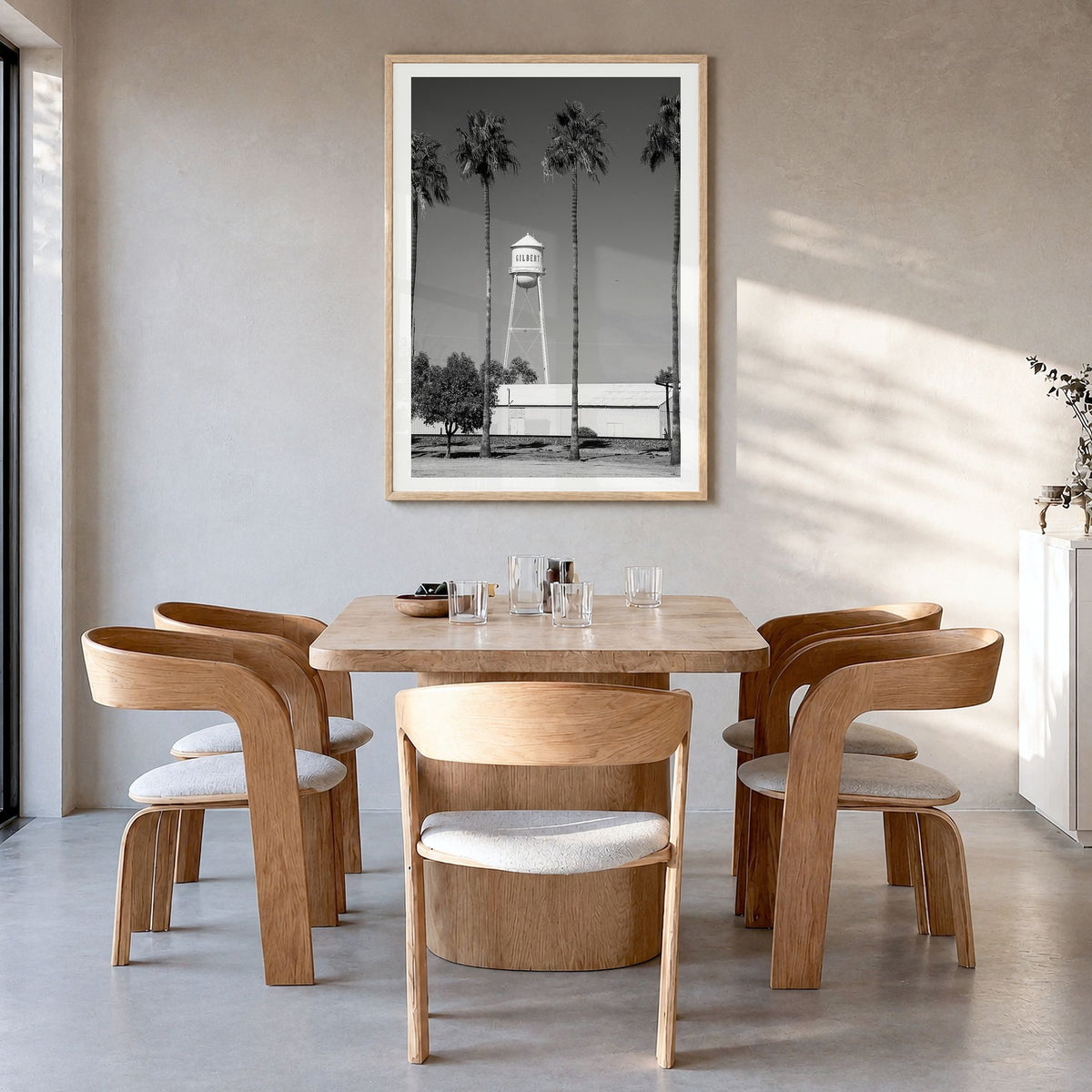 Water Tower Photo No 2 Poster in a natural wood frame, hanging in a dining room, white border