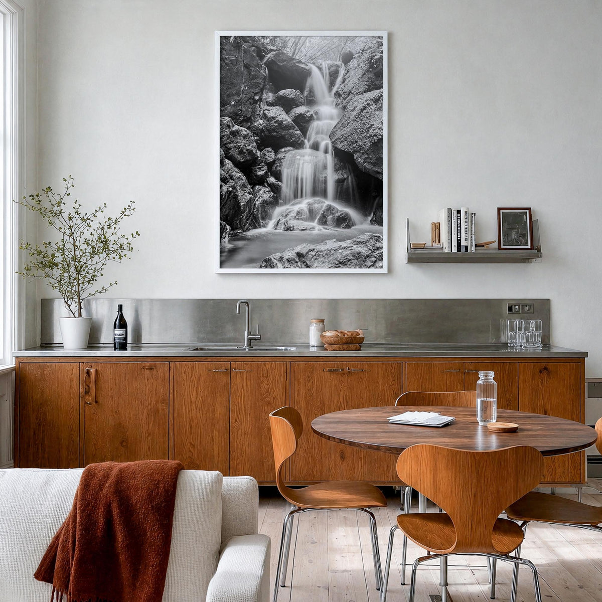 Waterfall no. 2 black & white photo poster – vertical wall art in white wood frame, hanging on wall