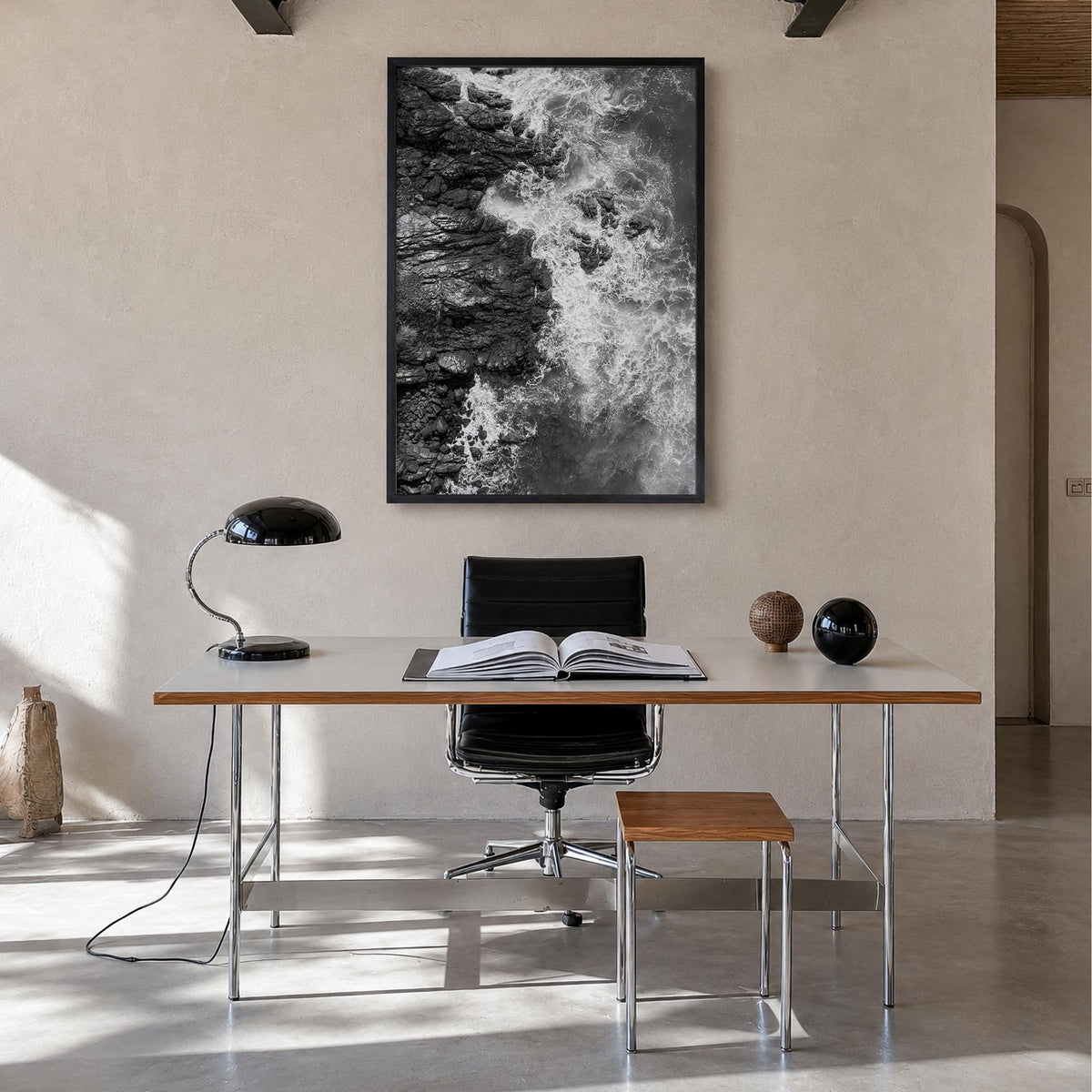 Waves Crashing no. 1 black & white photo poster – vertical wall art in black wood frame, hanging on wall
