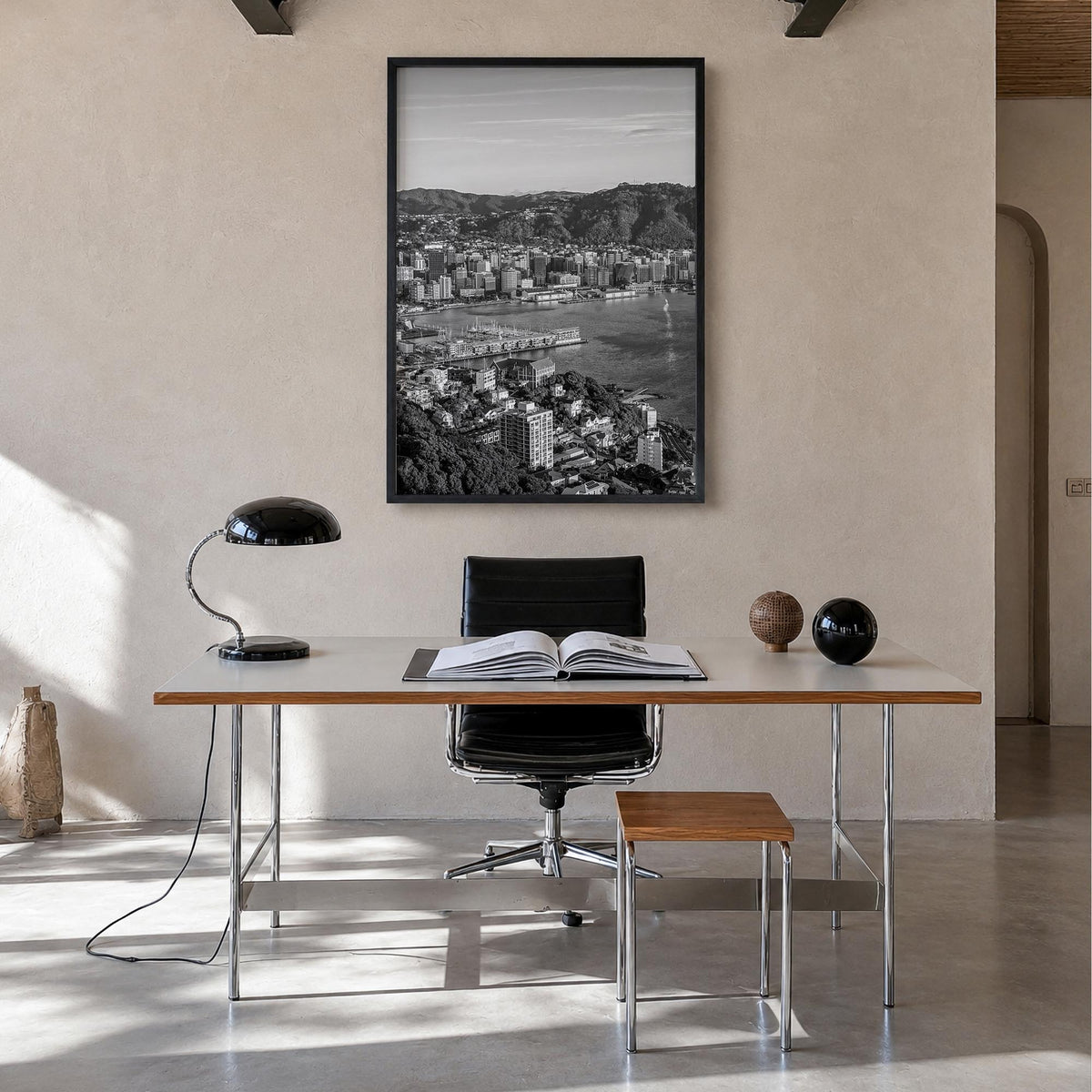 Wellington black & white photo poster of New Zealand – vertical wall art in black wood frame, hanging on wall