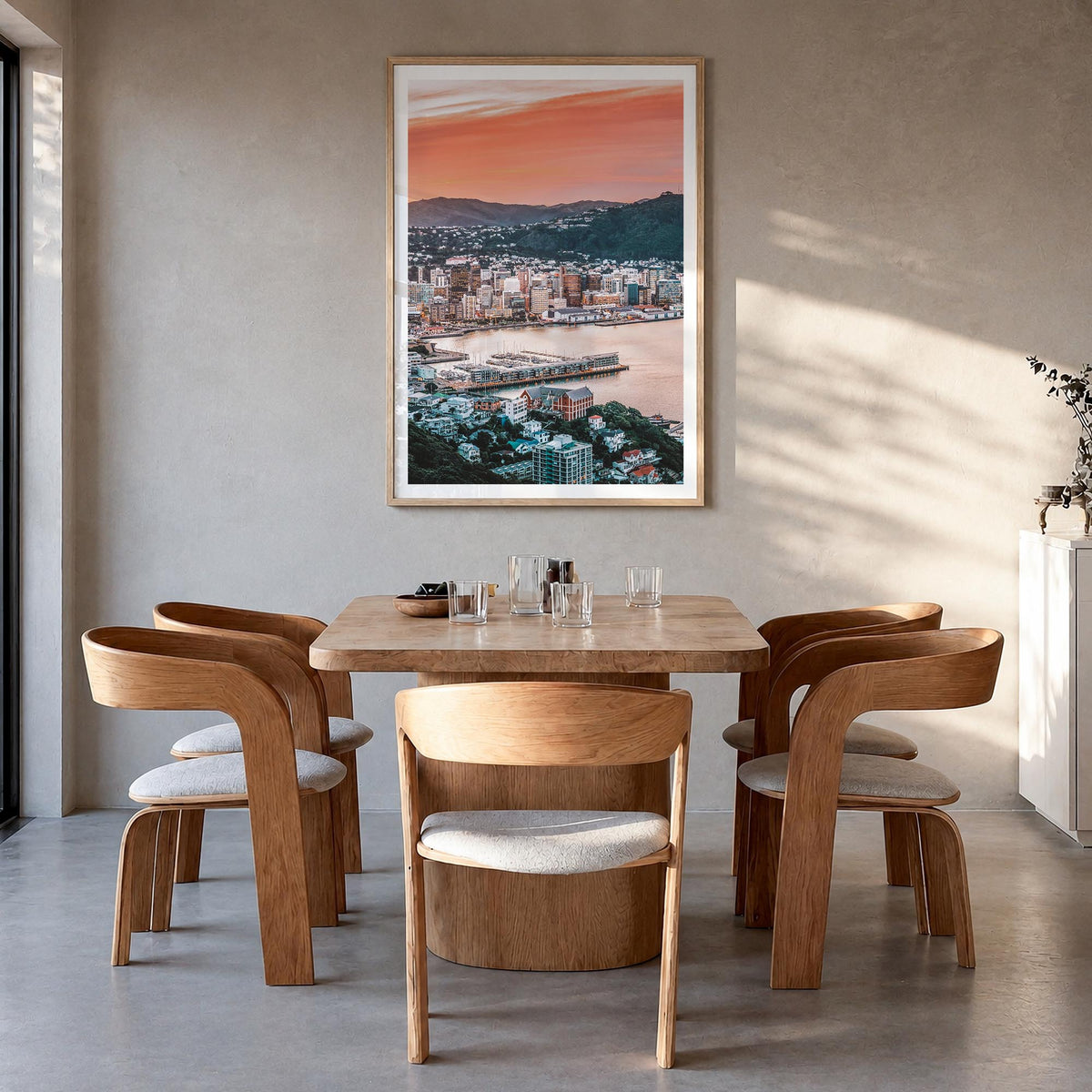 Wellington colorful photo poster of New Zealand – vertical wall art in natural wood frame with white border, hanging on wall