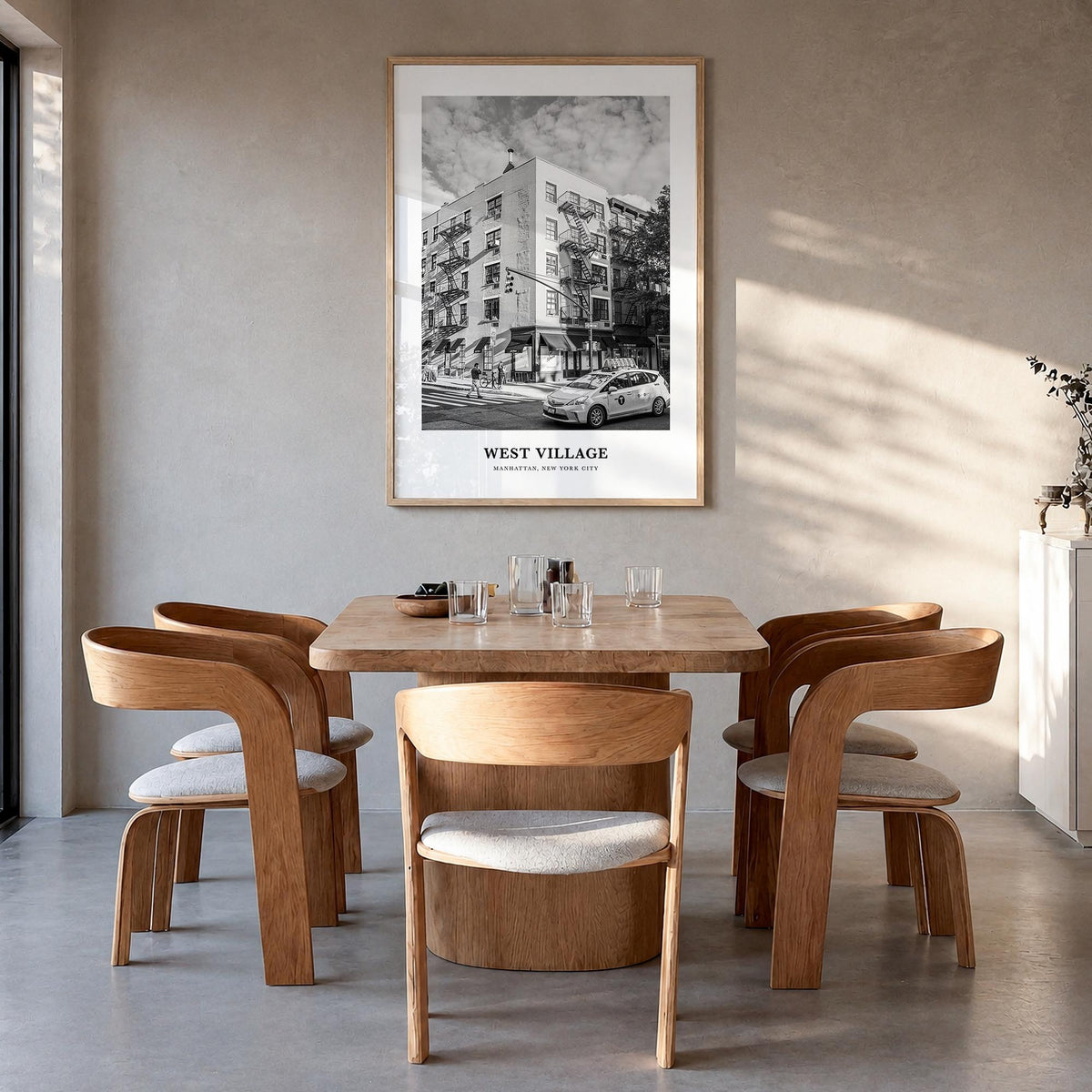 West Village black & white classic poster of Manhattan, New York City – vertical wall art in natural wood frame, hanging on w