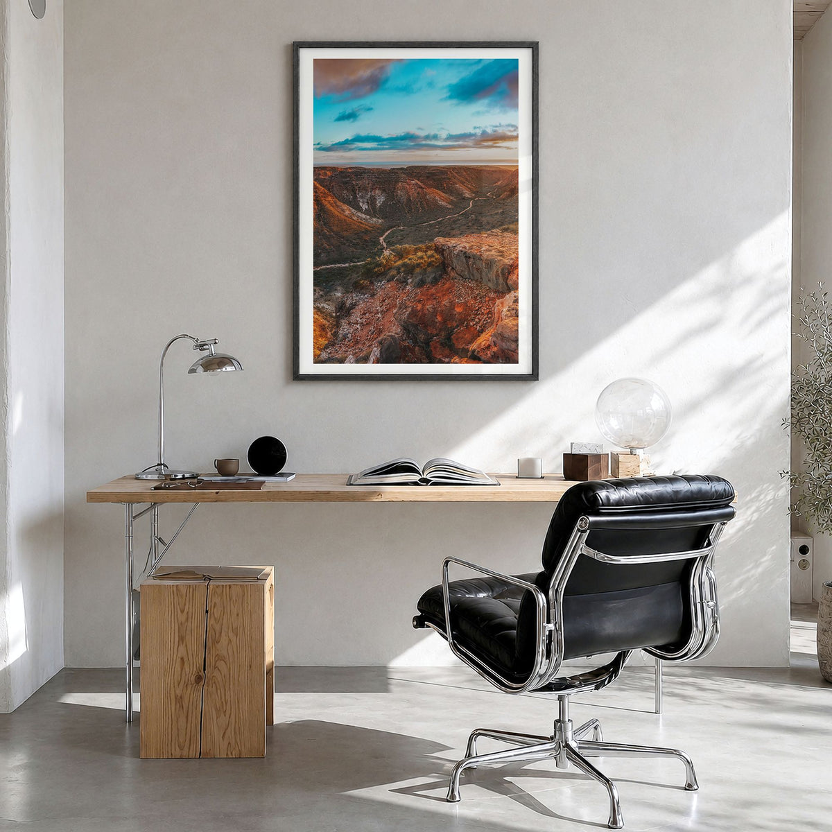 Western Australia Photo Poster in a black wood frame, hanging in a bright home office, white border