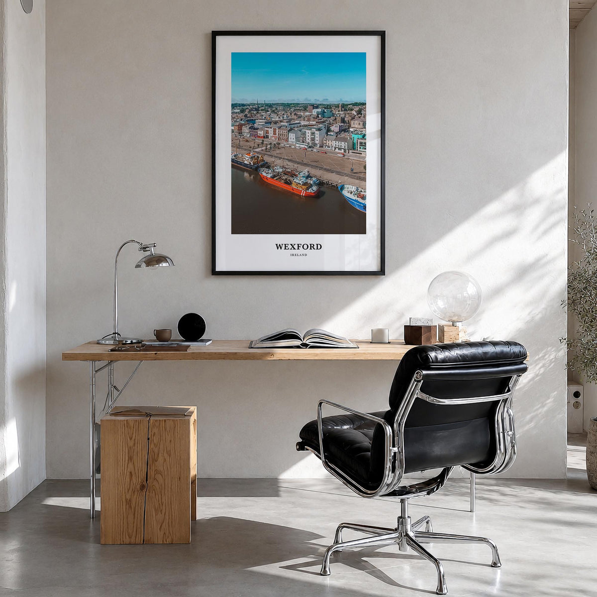 Wexford colorful classic poster of Ireland – vertical wall art in black wood frame, hanging on wall