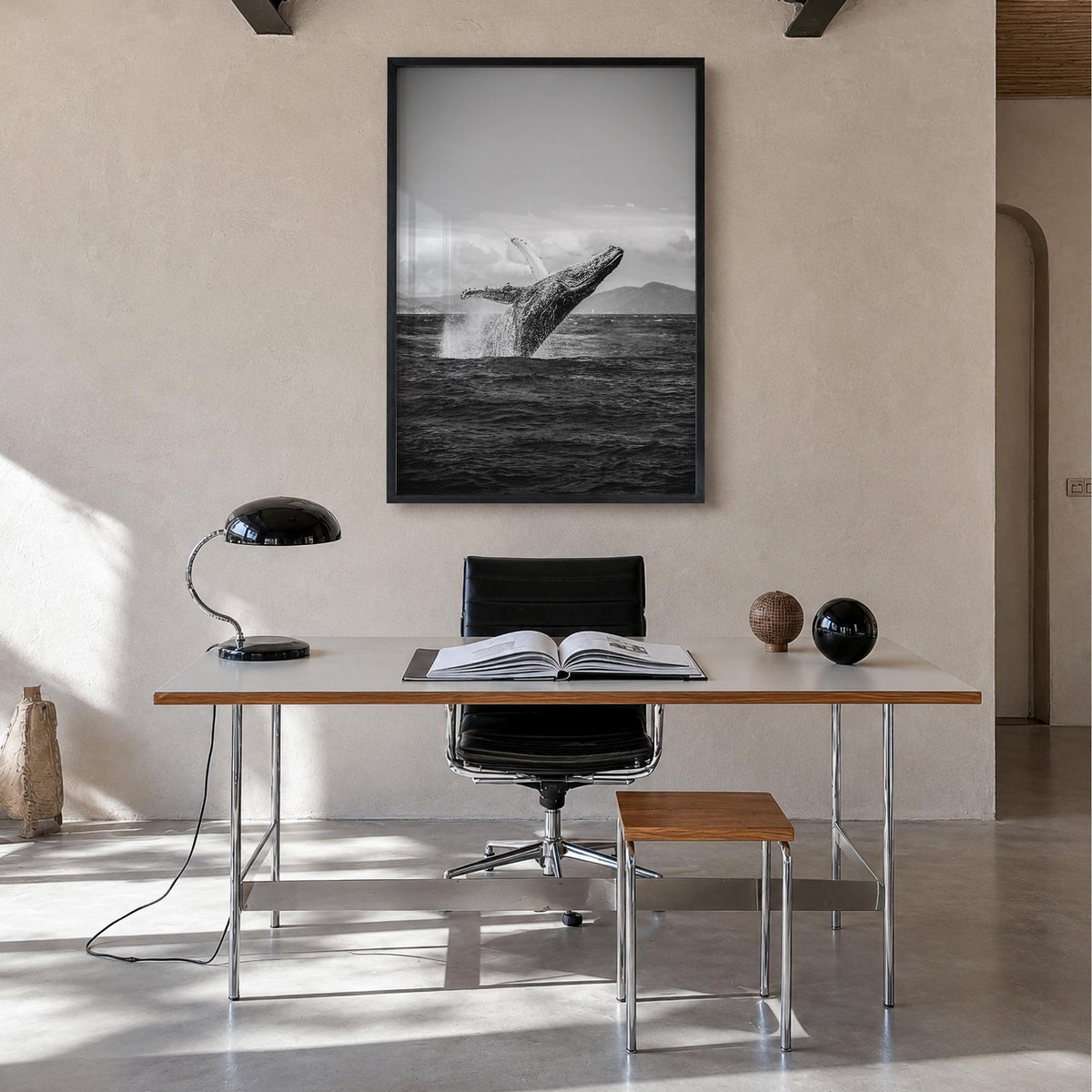 Whale no. 2 black & white photo poster – vertical wall art in black wood frame, hanging on wall