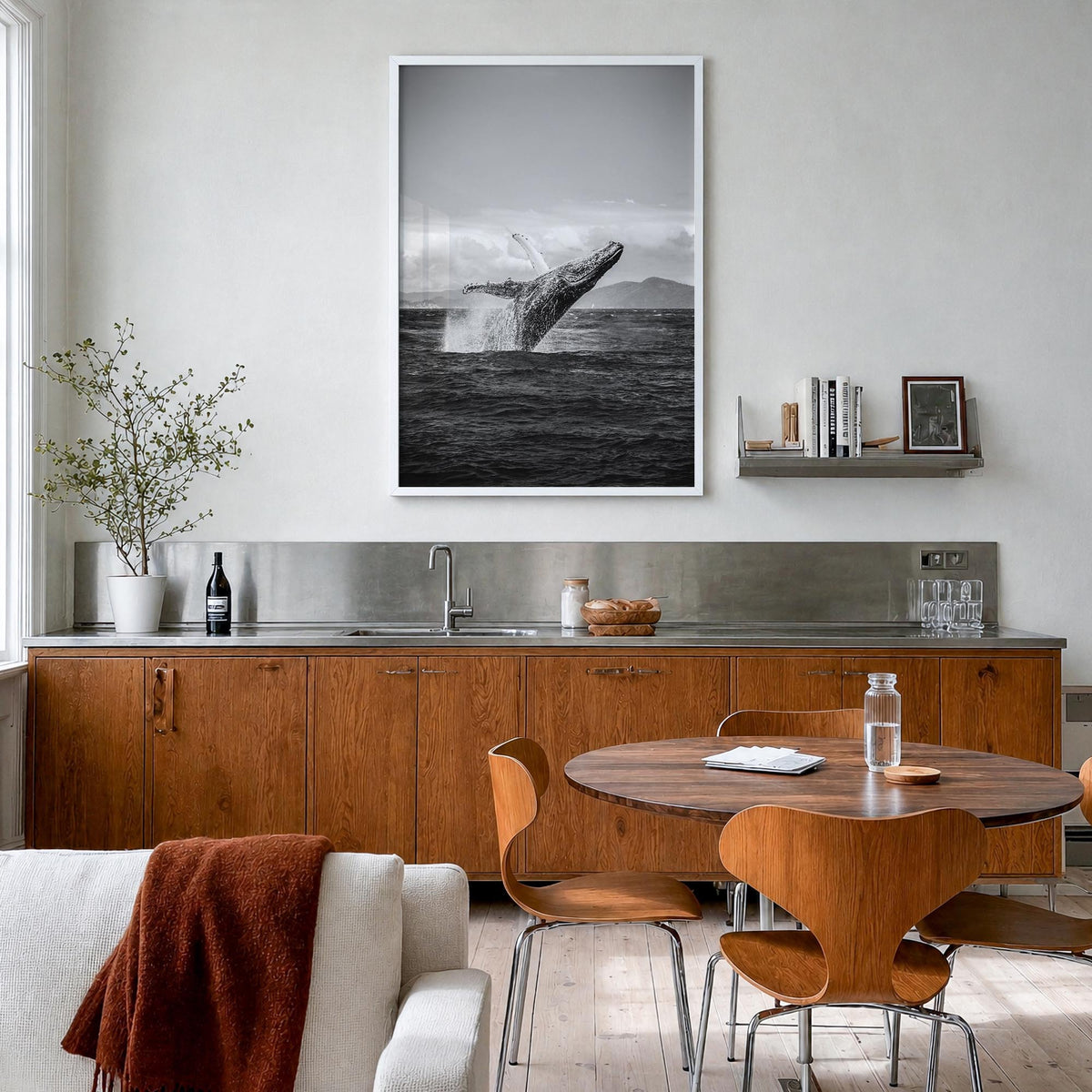 Whale no. 2 black & white photo poster – vertical wall art in white wood frame, hanging on wall