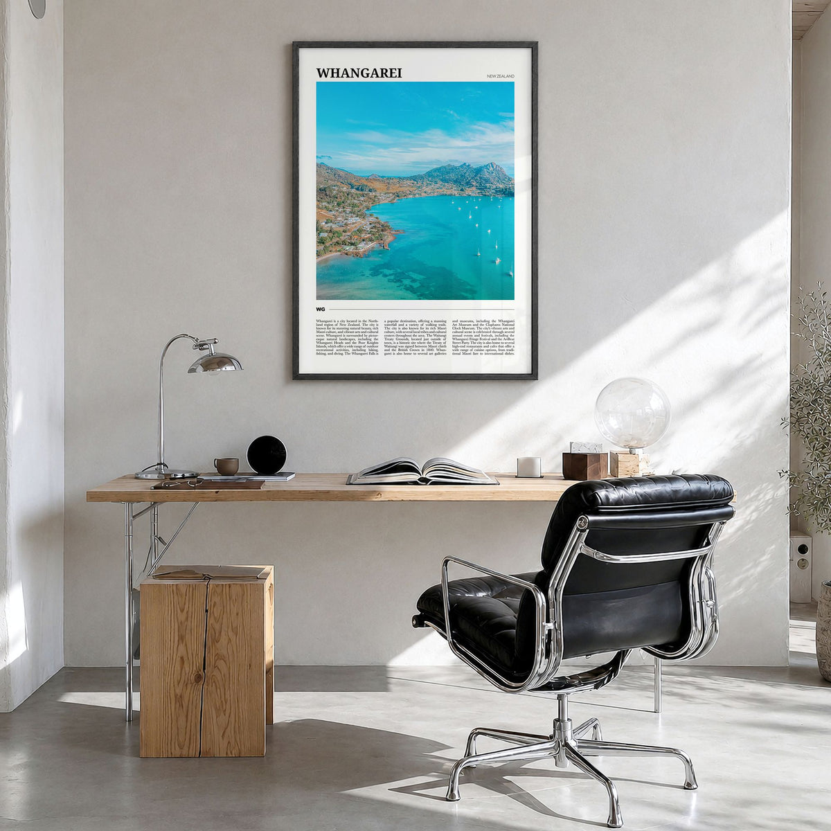 Whangārei Travel Poster in a black wood frame, hanging in a bright home office