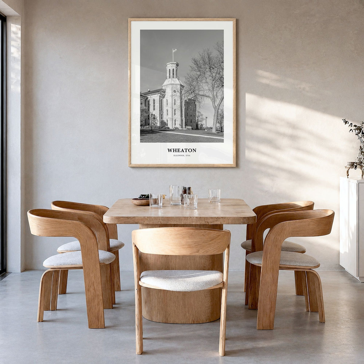 Wheaton Classic Poster in a natural wood frame, hanging in a dining room