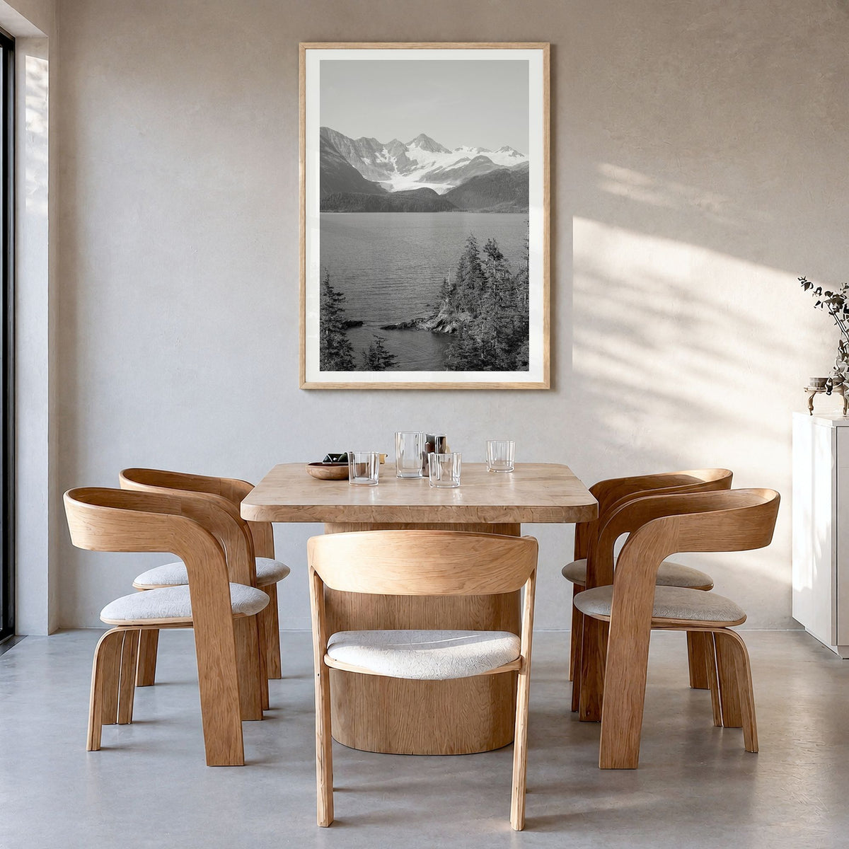 Whittier, Alaska Photo Poster in a natural wood frame, hanging in a dining room, white border
