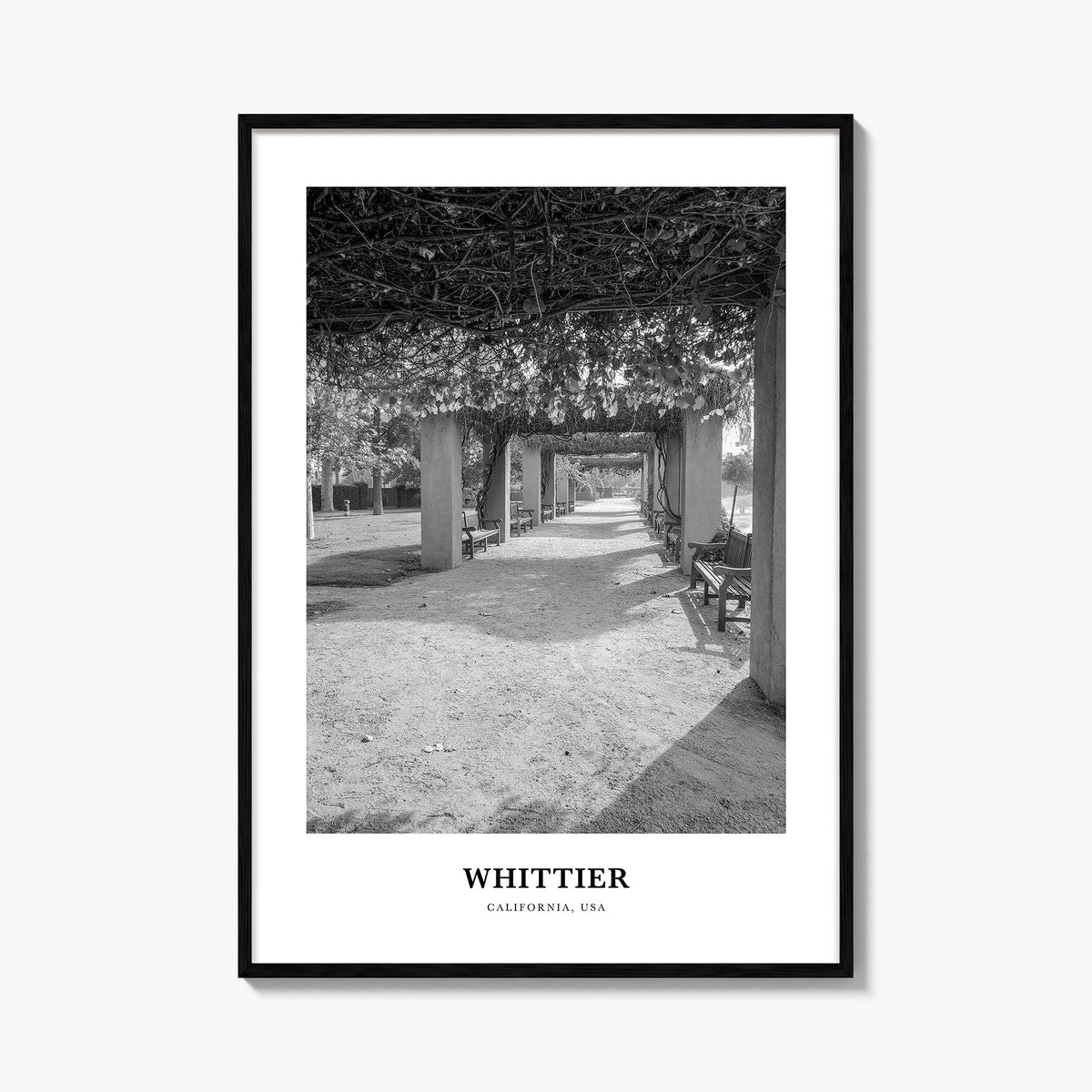 Whittier, California black & white classic poster of California, USA – vertical wall art, unframed print shown in interior mo