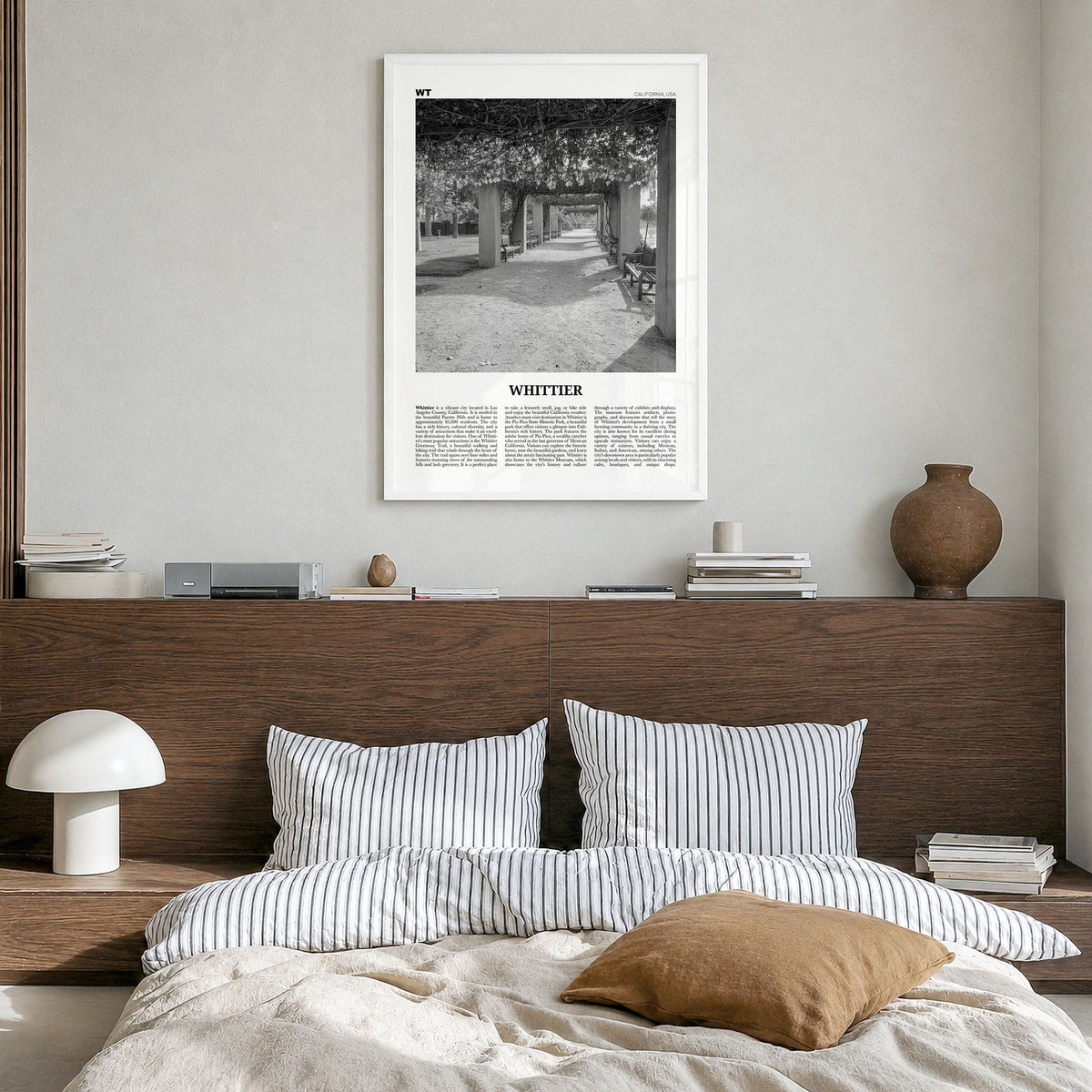 Whittier, California Newspaper Poster in a white wood frame, hanging in a bedroom