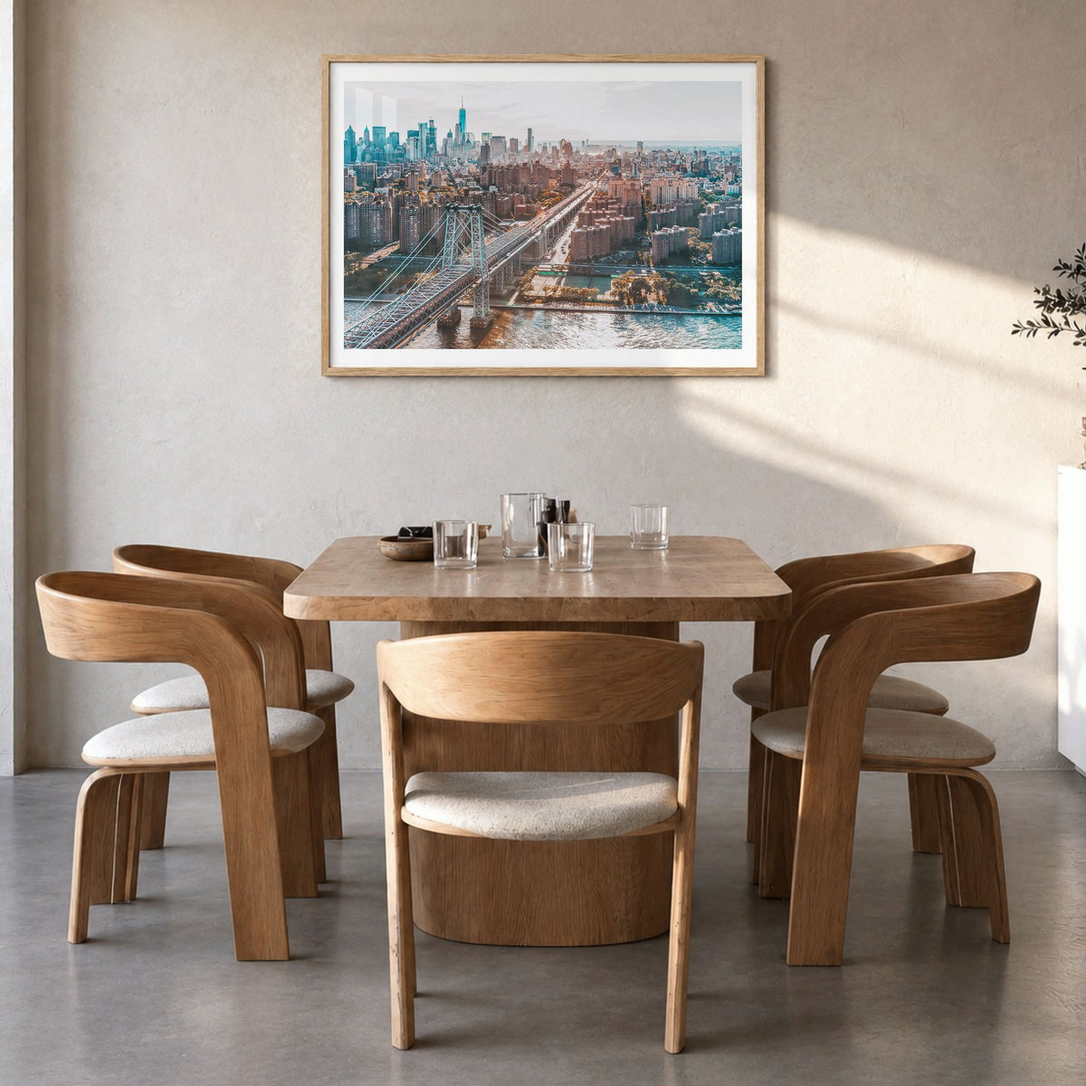 Williamsburg, New York Photo Poster in a natural wood frame, hanging in a dining room, white border