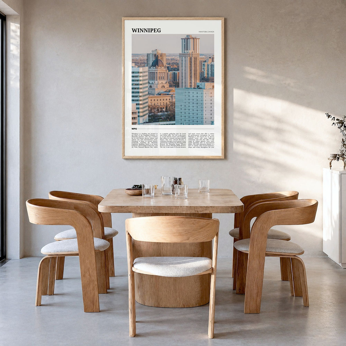Winnipeg Travel No 2 Poster in a natural wood frame, hanging in a dining room