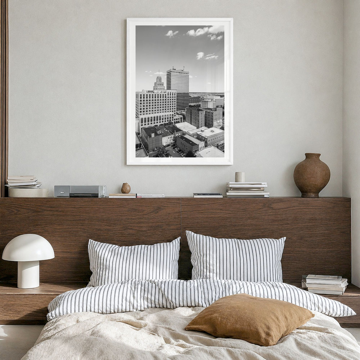 Winston-Salem Photo Poster in a white wood frame, hanging in a bedroom, white border