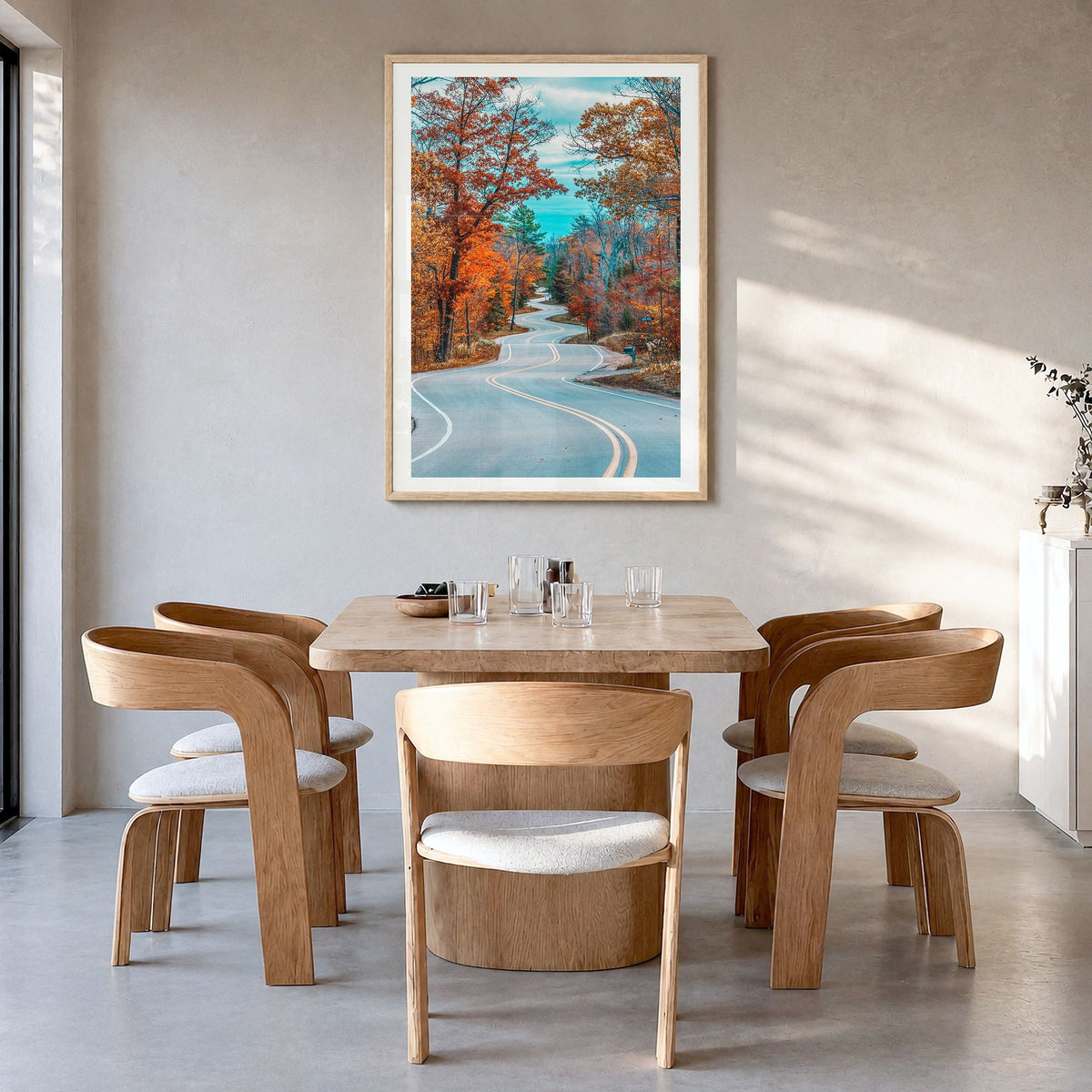 Wisconsin Photo No 2 Poster in a natural wood frame, hanging in a dining room, white border