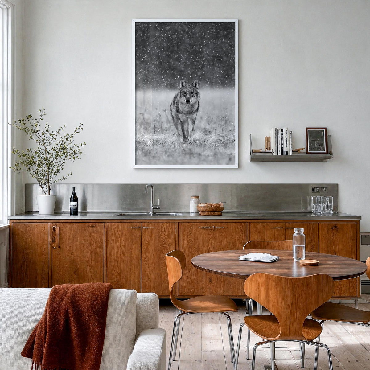 Wolf black & white photo poster – vertical wall art in white wood frame, hanging on wall