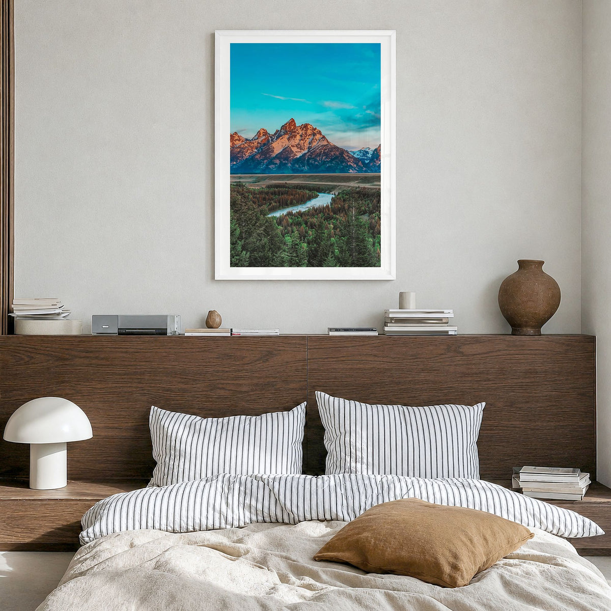 Wyoming Photo Poster in a white wood frame, hanging in a bedroom, white border