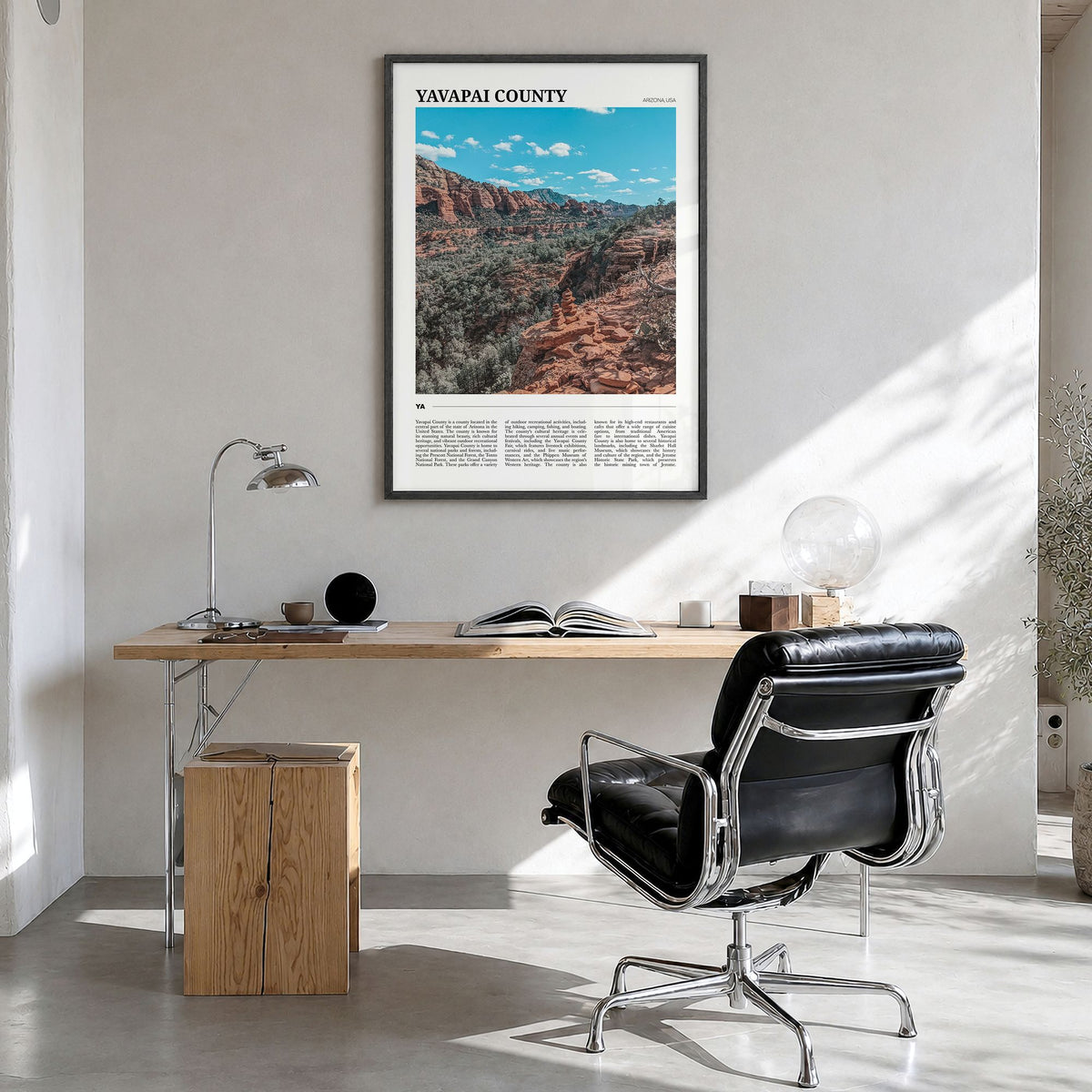 Yavapai County Travel Poster in a black wood frame, hanging in a bright home office