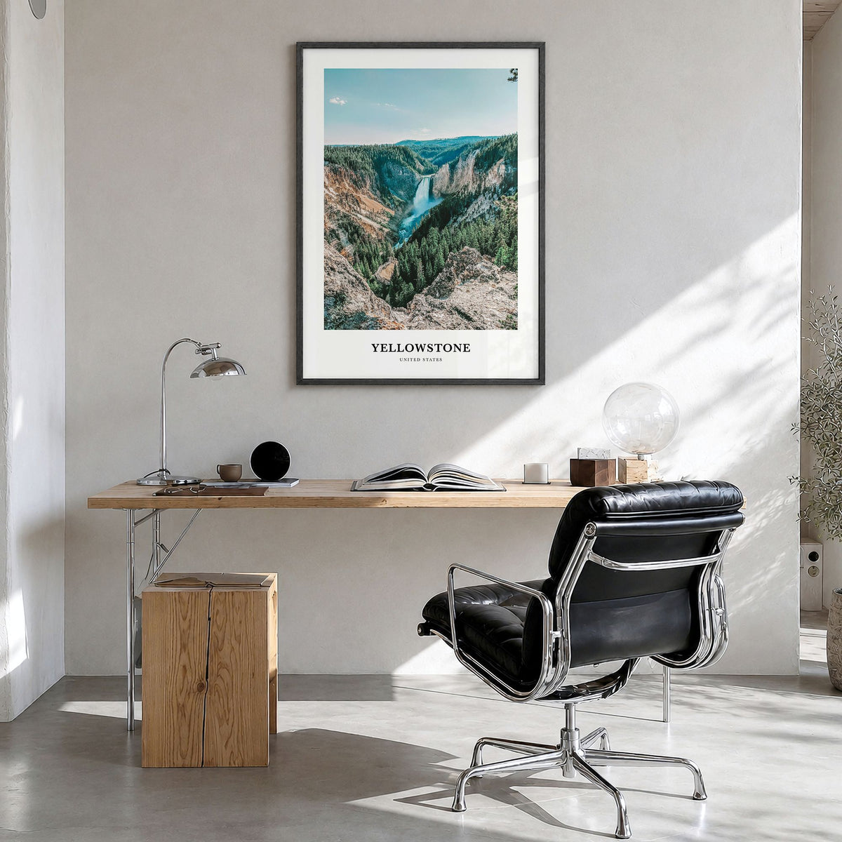 Yellowstone National Park Classic No 1 Poster in a black wood frame, hanging in a bright home office