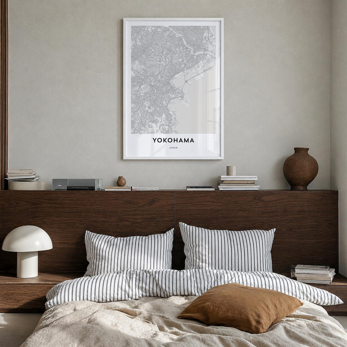 Yokohama black & white map poster of Japan – vertical wall art in white wood frame, hanging on wall