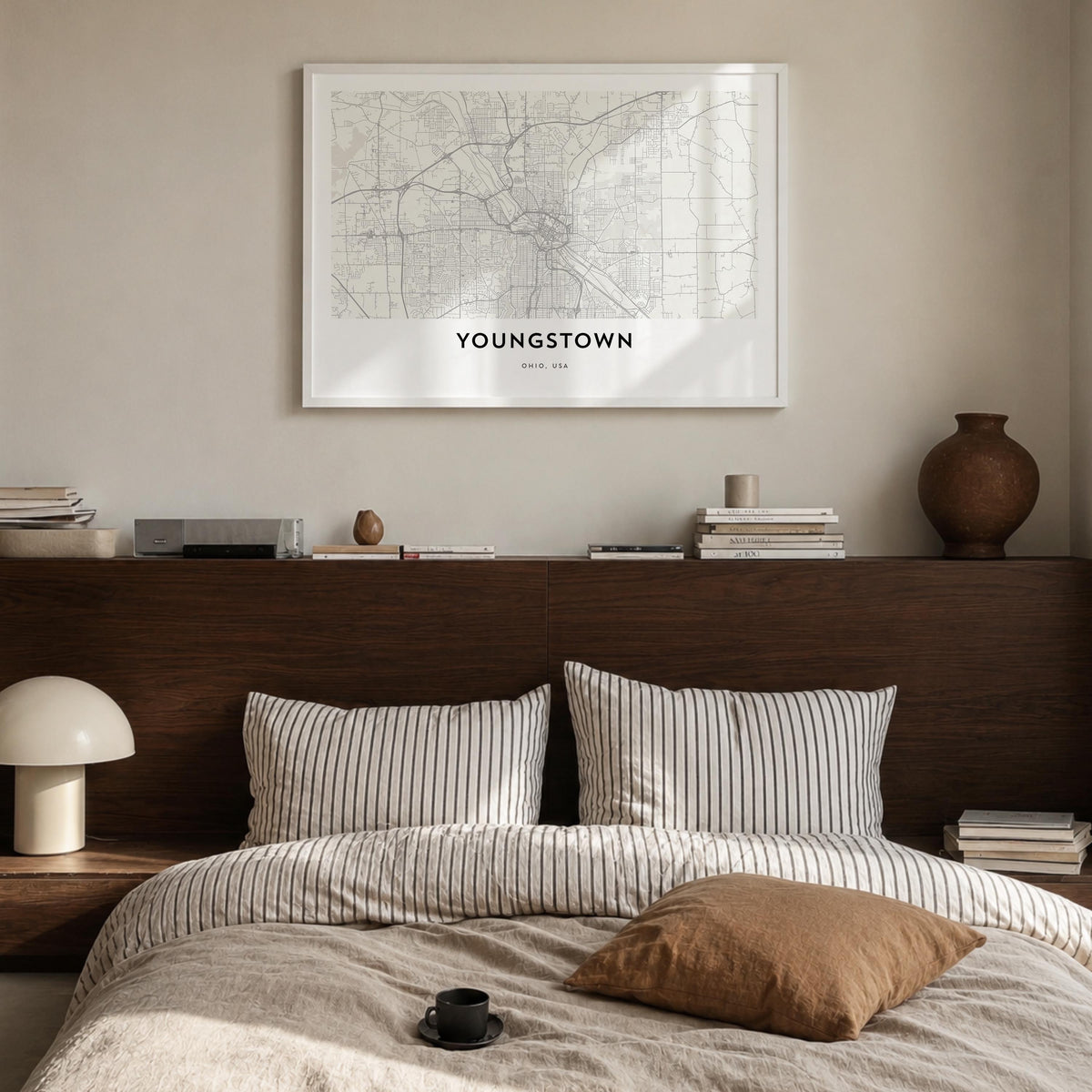 Youngstown black & white map poster of Ohio, USA – horizontal wall art in white wood frame, hanging on wall