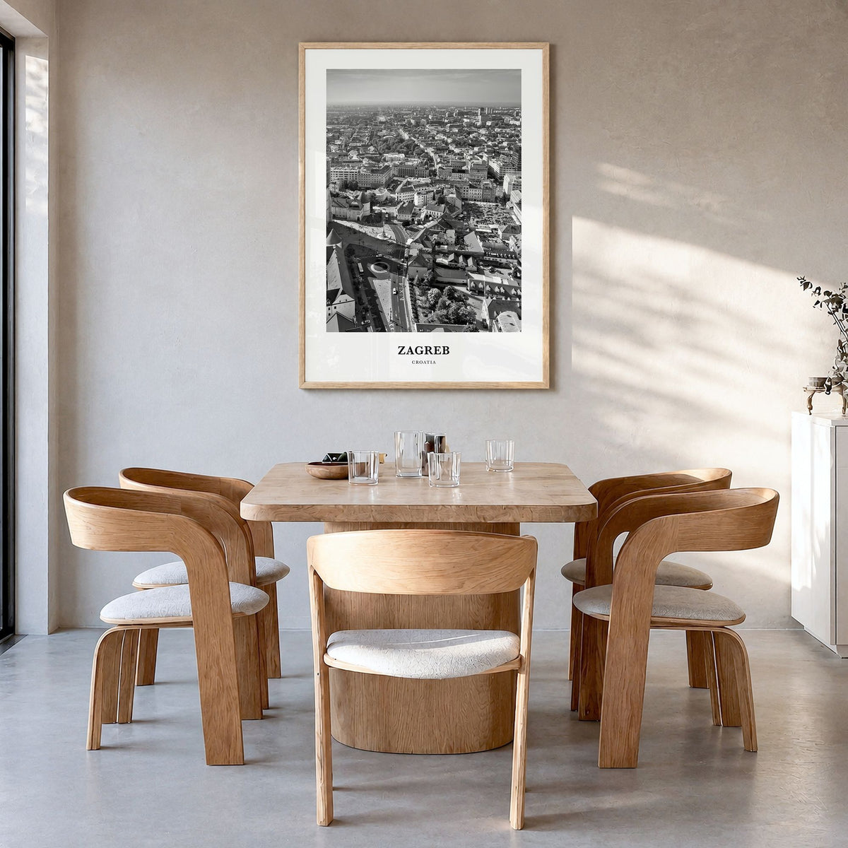 Zagreb Classic Poster in a natural wood frame, hanging in a dining room