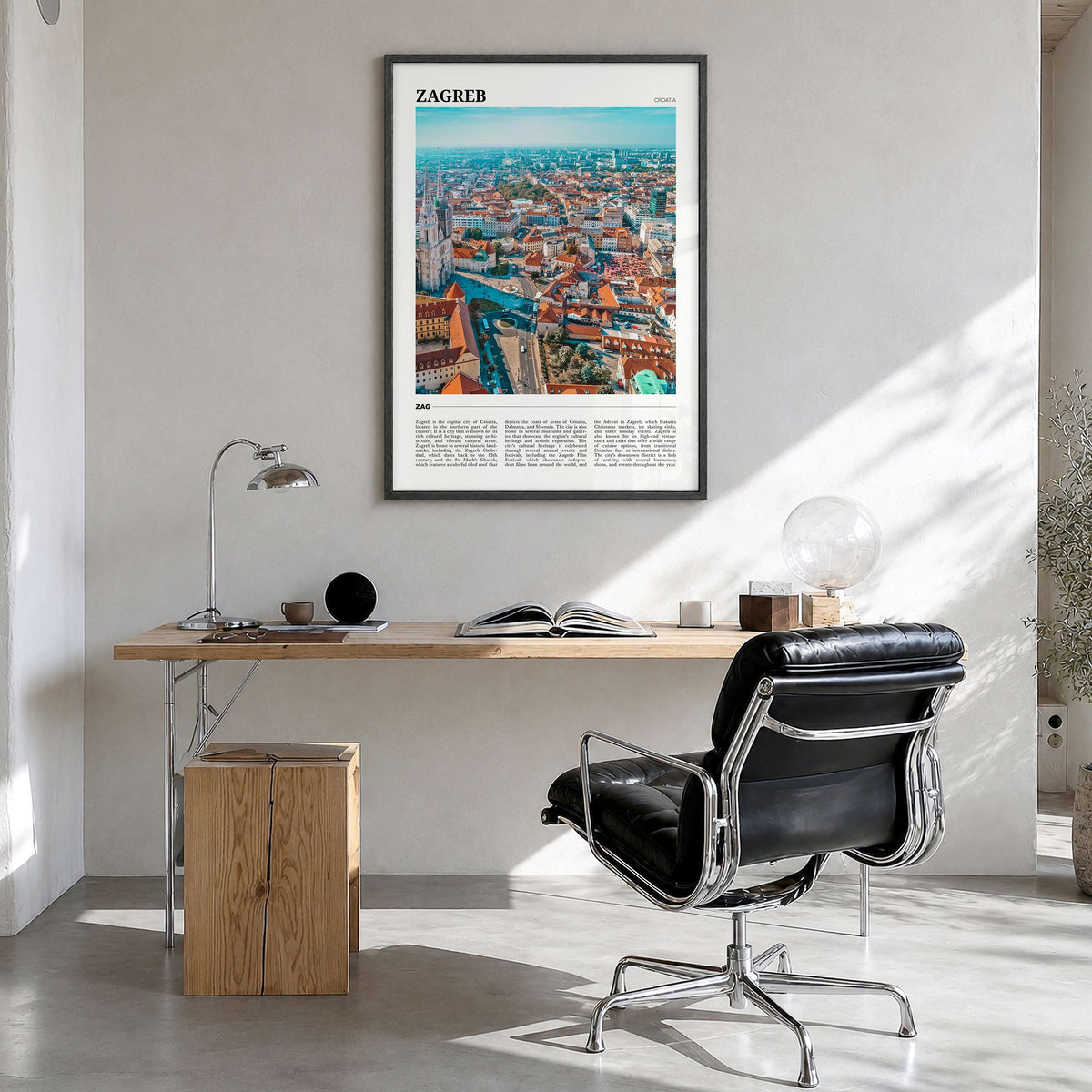 Zagreb Travel Poster in a black wood frame, hanging in a bright home office