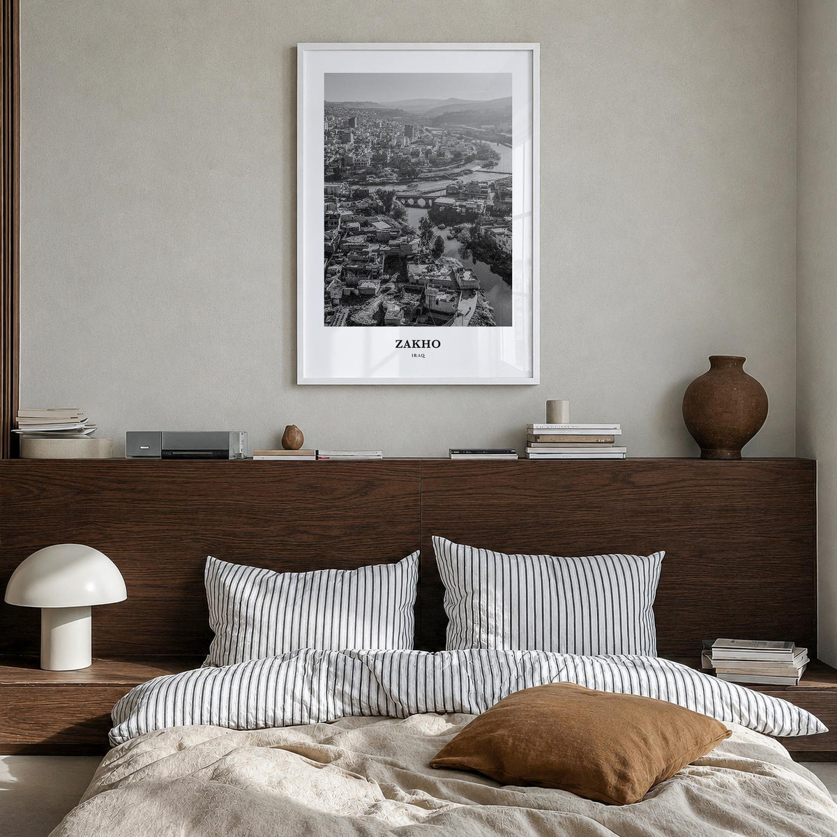 Zakho black & white classic poster of Iraq – vertical wall art in white wood frame, hanging on wall
