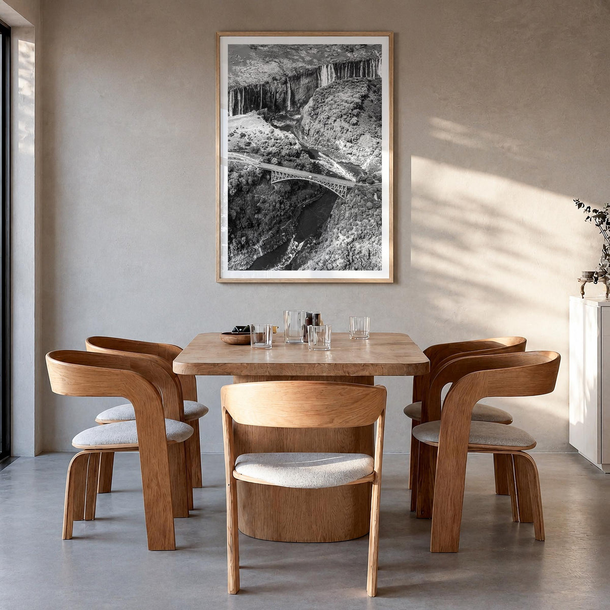 Zambia black & white photo poster of Africa – vertical wall art in natural wood frame with white border, hanging on wall