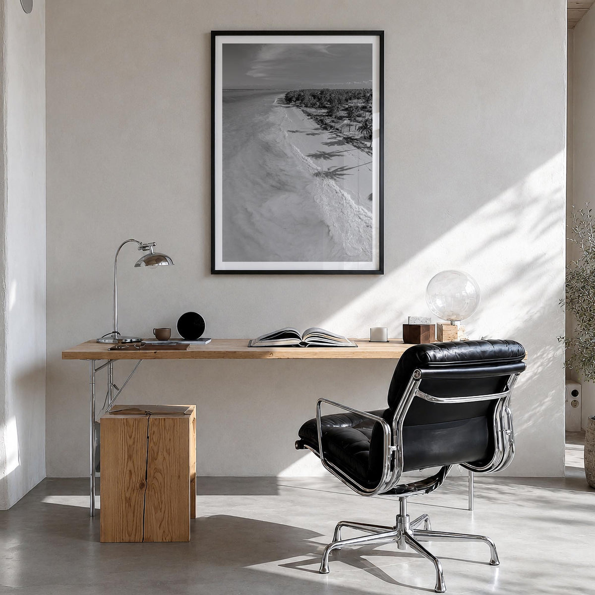 Zanzibar black & white photo poster of Tanzania – vertical wall art in black wood frame with white border, hanging on wall