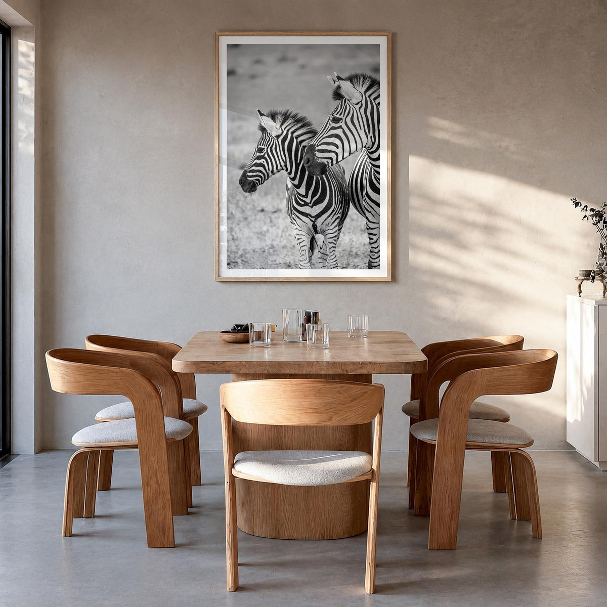 Zebra no. 2 black & white photo poster – vertical wall art in natural wood frame with white border, hanging on wall