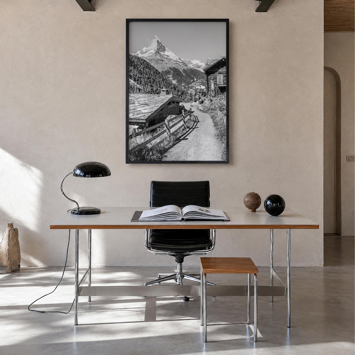 Zermatt black & white photo poster of Switzerland – vertical wall art in black wood frame, hanging on wall