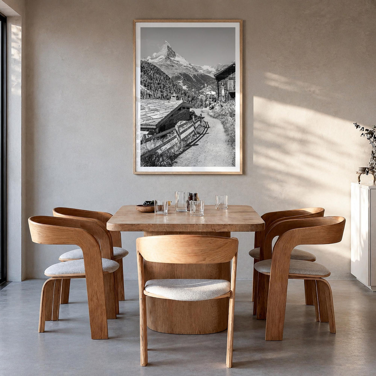 Zermatt black & white photo poster of Switzerland – vertical wall art in natural wood frame with white border, hanging on wal