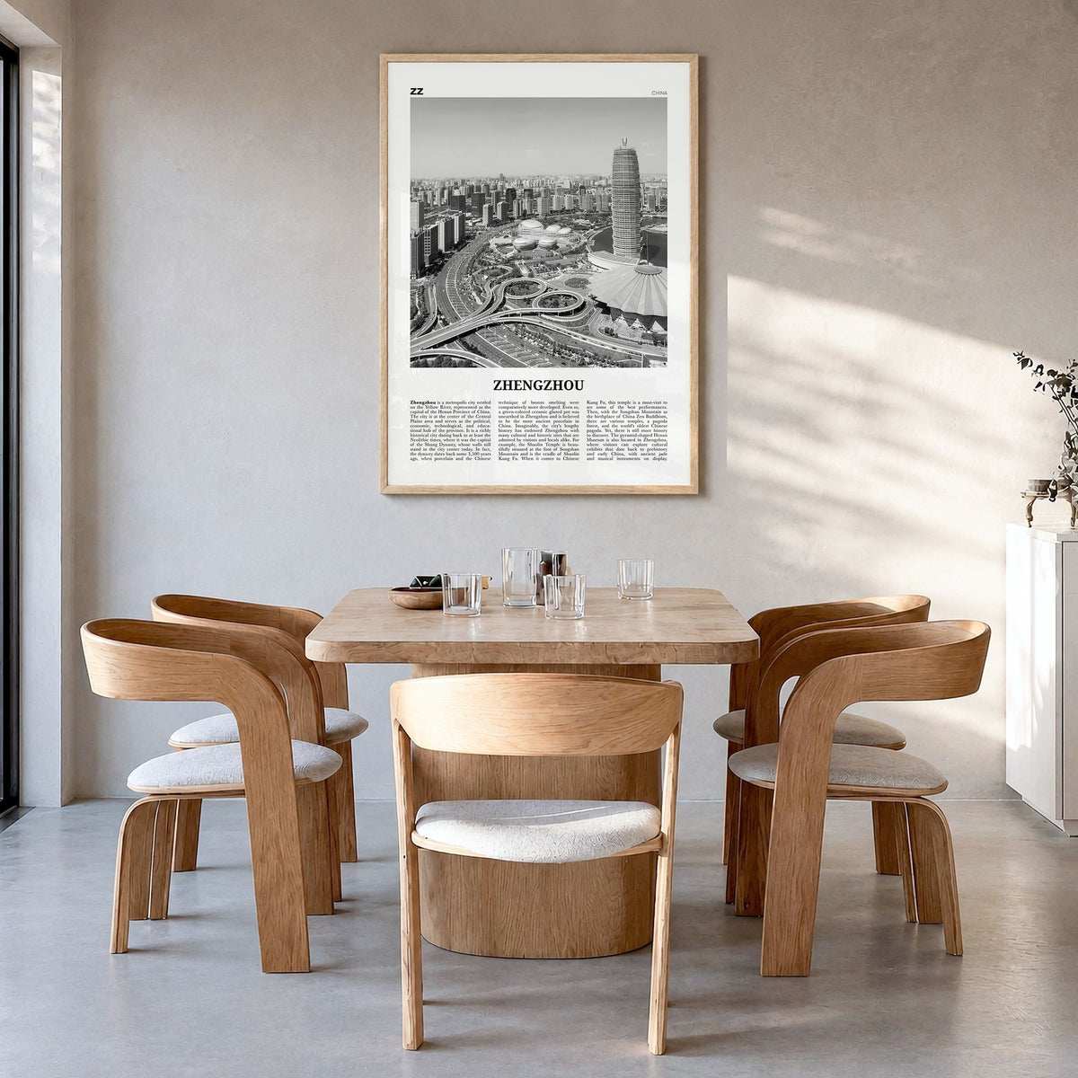 Zhengzhou Newspaper Poster in a natural wood frame, hanging in a dining room