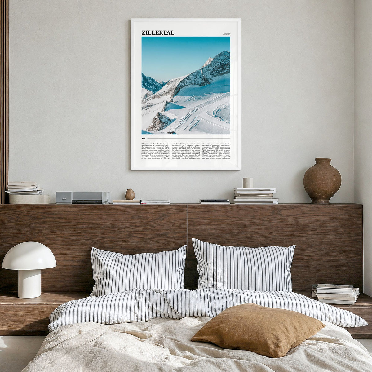 Zillertal Travel Poster in a white wood frame, hanging in a bedroom