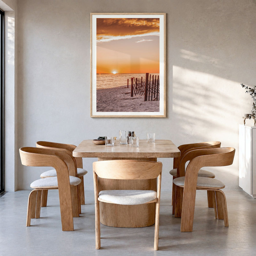 30A Photo Poster in a natural wood frame, hanging in a dining room, white border