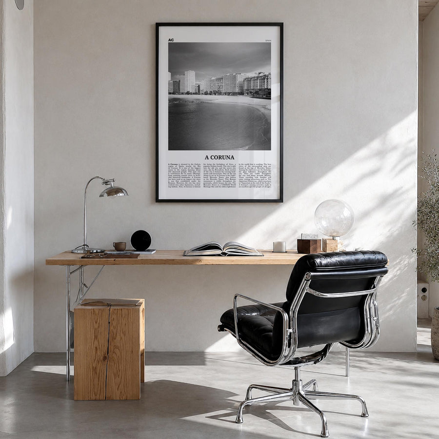 A Coruña black & white newspaper poster of Spain – vertical wall art in black wood frame, hanging on wall