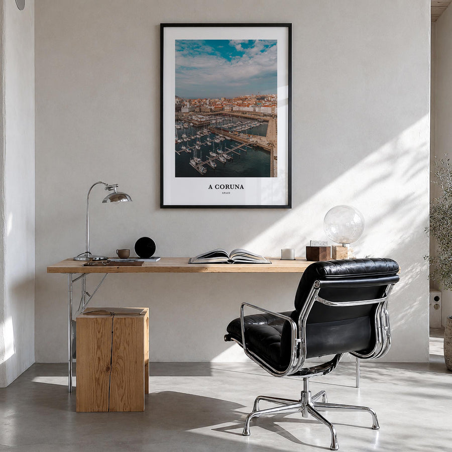 A Coruña colorful classic poster of Spain – vertical wall art in black wood frame, hanging on wall