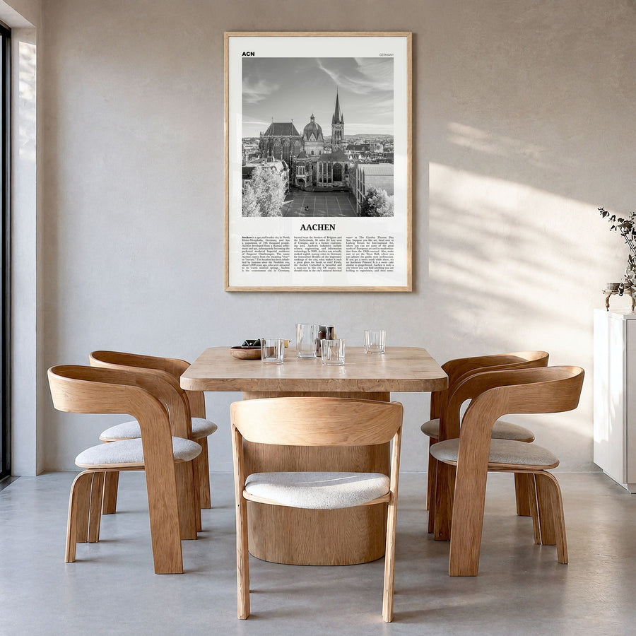 Aachen Newspaper Poster in a natural wood frame, hanging in a dining room