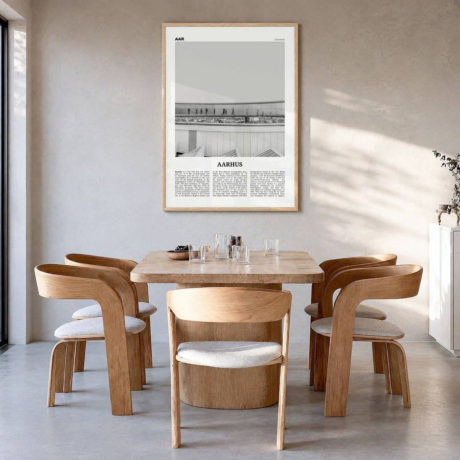 Aarhus Newspaper No 2 Poster in a natural wood frame, hanging in a dining room