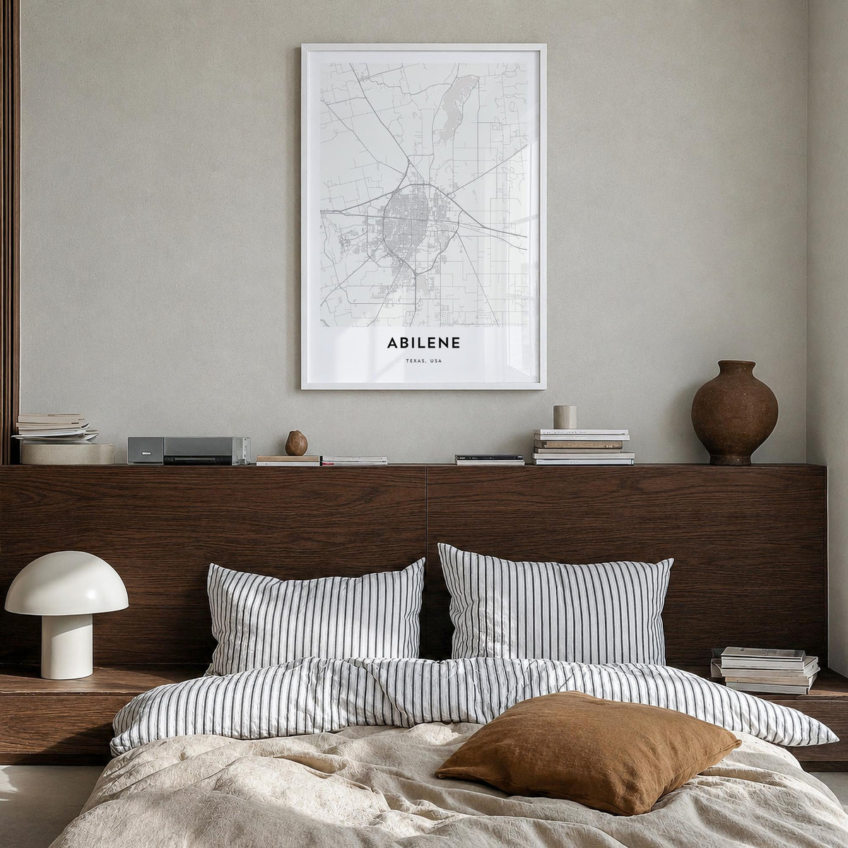 Abilene black & white map poster of Texas, USA – vertical wall art in white wood frame, hanging on wall