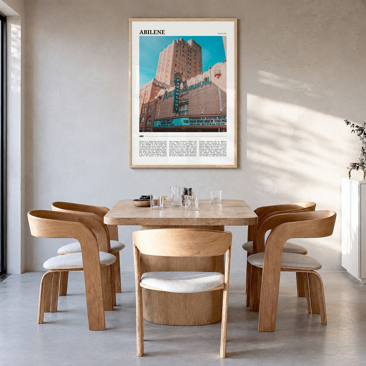 Abilene Travel Poster in a natural wood frame, hanging in a dining room