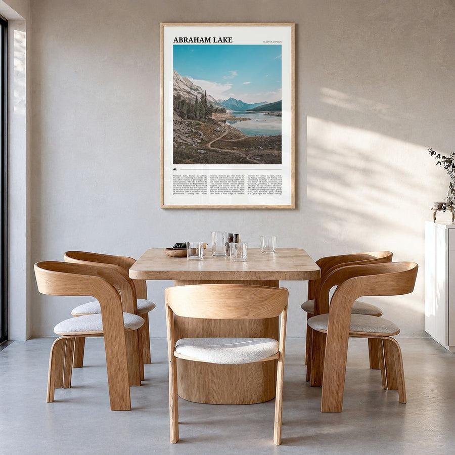 Abraham Lake Travel Poster in a natural wood frame, hanging in a dining room