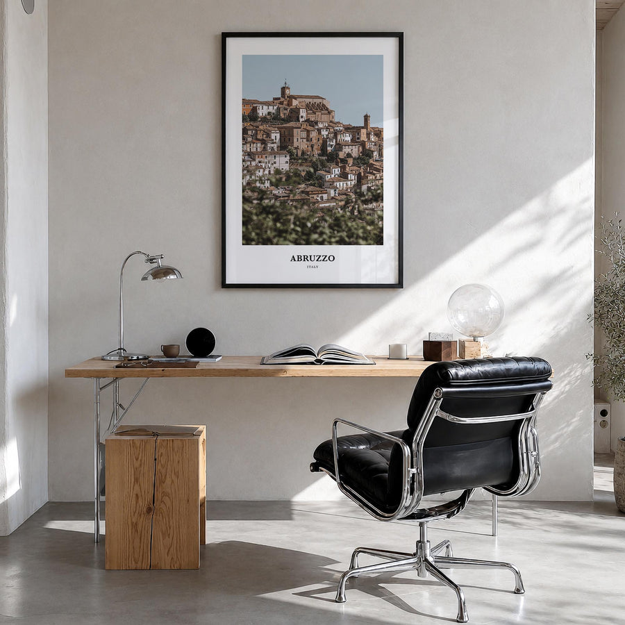 Abruzzo no. 1 colorful classic poster of Italy – vertical wall art in black wood frame, hanging on wall