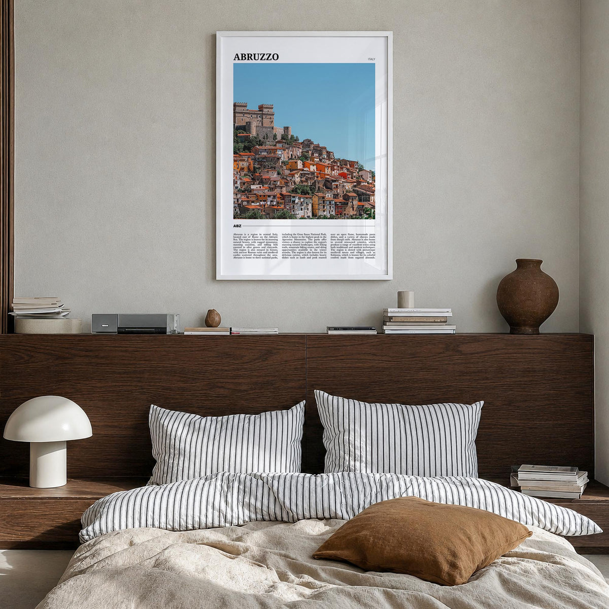 Abruzzo no. 2 colorful travel poster of Italy – vertical wall art in white wood frame, hanging on wall
