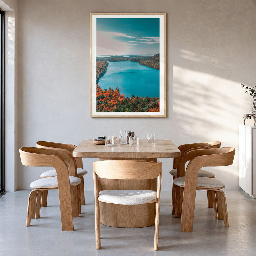 Acadia National Park Photo Poster in a natural wood frame, hanging in a dining room, white border