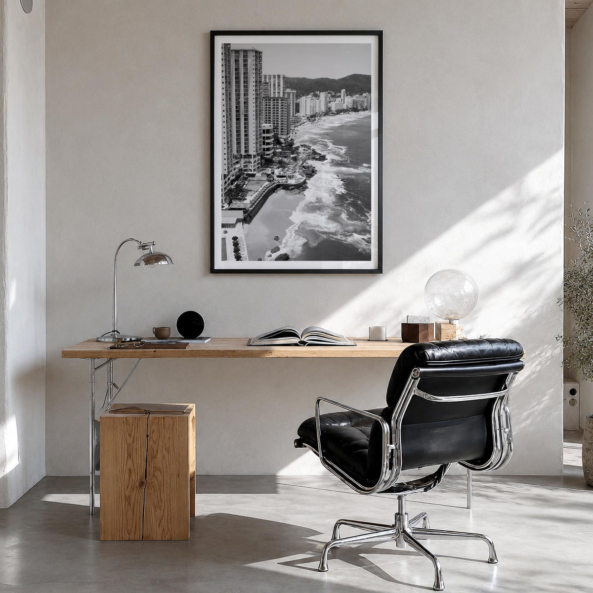 Acapulco de Juárez black & white photo poster of Mexico – vertical wall art in black wood frame with white border, hanging on