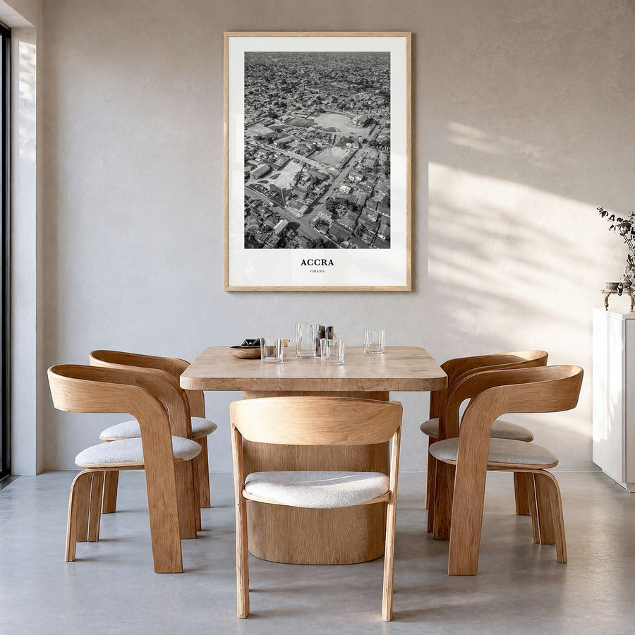 Accra Classic Poster in a natural wood frame, hanging in a dining room