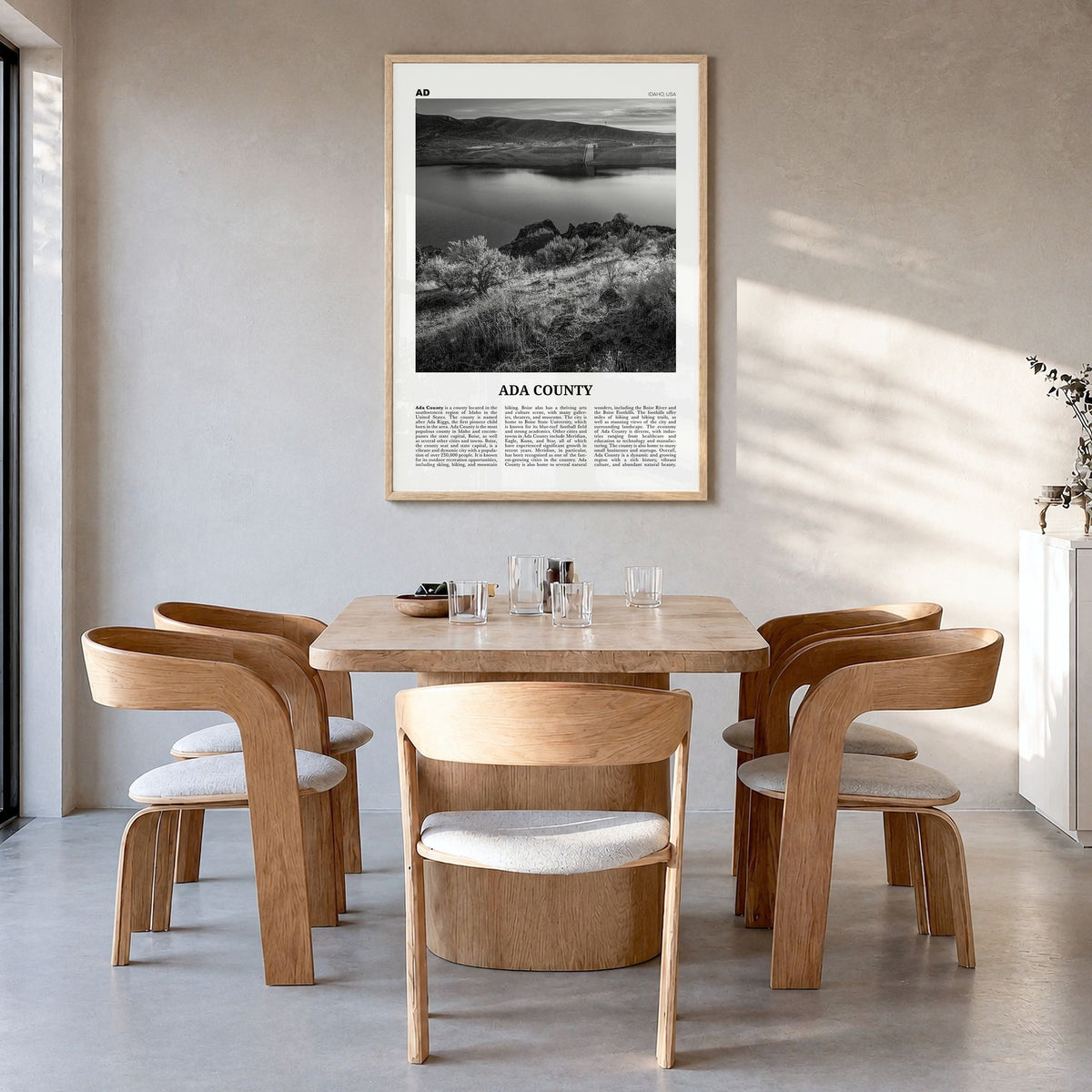 Ada County Newspaper Poster in a natural wood frame, hanging in a dining room