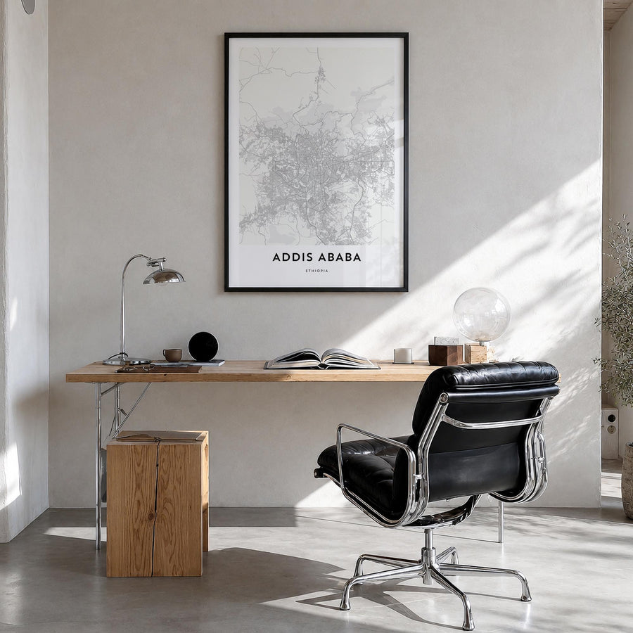 Addis Ababa black & white map poster of Ethiopia – vertical wall art in black wood frame, hanging on wall